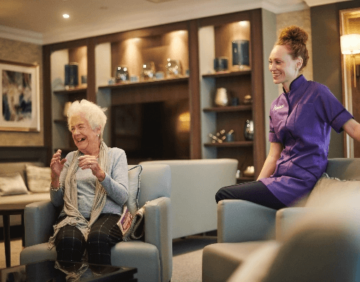 Old lady and a nurse.